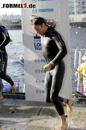 Foto zur News: Wenn es im PS-Zirkus mal nicht nach Plan läuft, bekommt Button bei seiner Leidenschaft Triathlon stets den Kopf frei