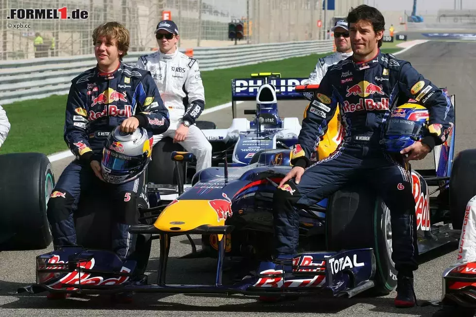 Foto zur News: Sebastian Vettel (Red Bull) und Mark Webber (Red Bull)