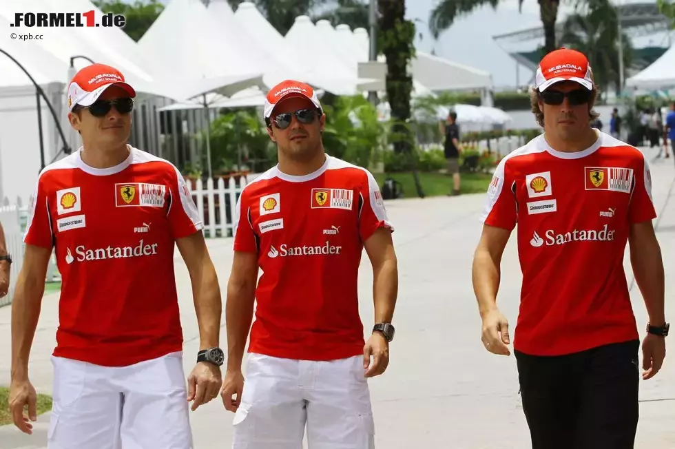 Foto zur News: Giancarlo Fisichella (Ferrari), Felipe Massa (Ferrari) und Fernando Alonso (Ferrari)