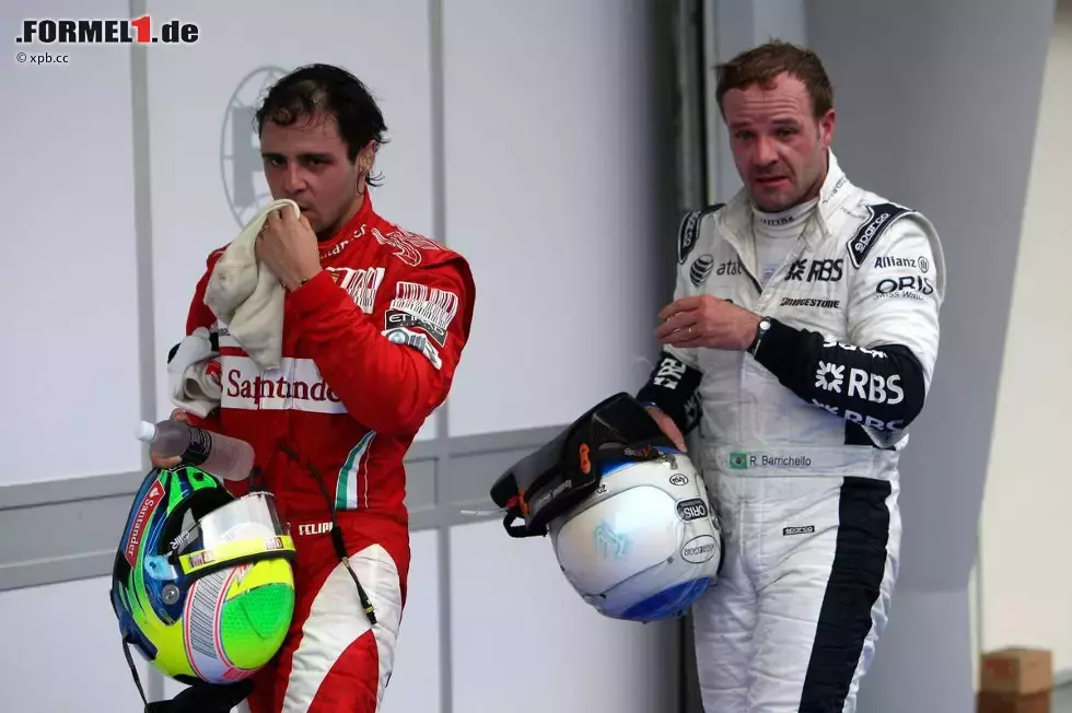 Foto zur News: Nach einem anstrengenden Rennen: Felipe Massa (Ferrari) und Rubens Barrichello (Williams)