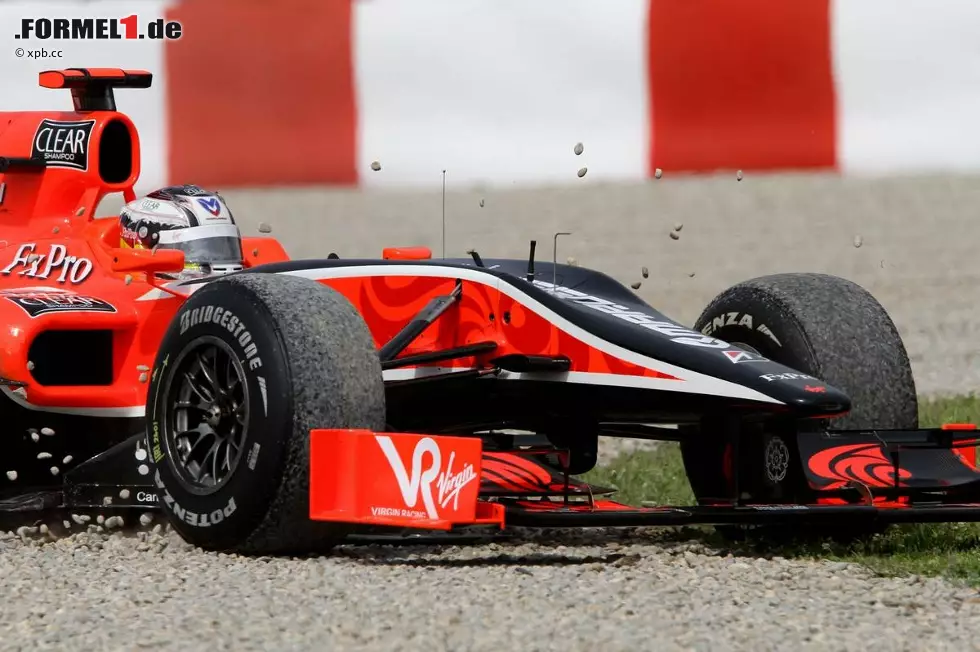 Foto zur News: Timo Glock (Virgin) im Kies