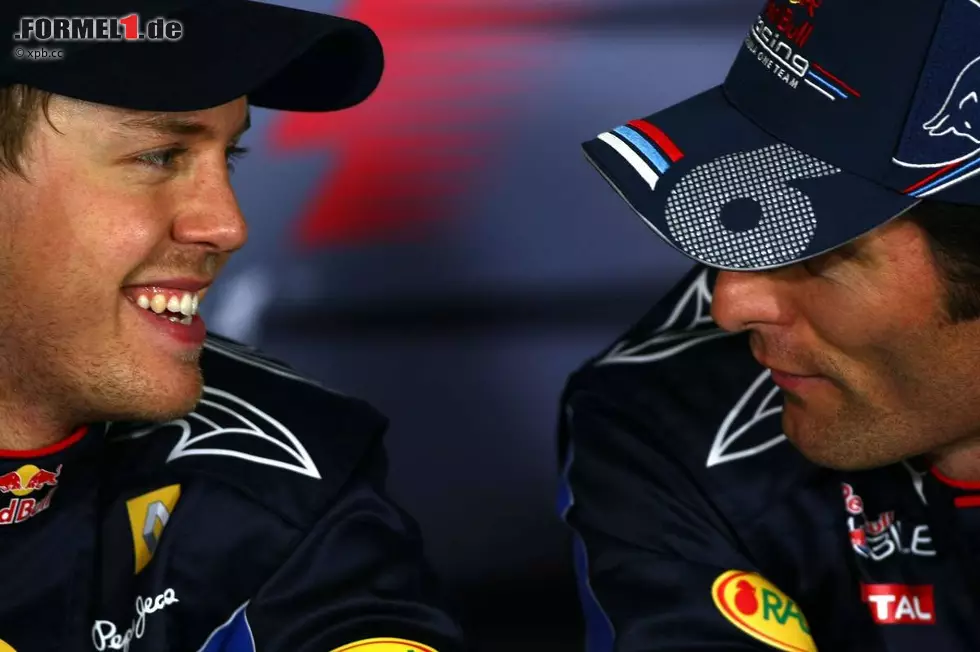 Foto zur News: Sebastian Vettel (Red Bull) und Mark Webber (Red Bull)