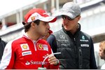 Foto zur News: Felipe Massa (Ferrari) und Michael Schumacher (Mercedes)