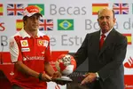 Foto zur News: Fernando Alonso (Ferrari) und Emilio Botin von Santander