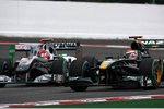 Foto zur News: Michael Schumacher (Mercedes) und Jarno Trulli (Lotus)