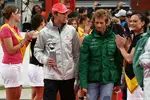 Foto zur News: Jenson Button (McLaren) und Jarno Trulli (Lotus)