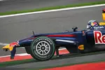 Foto zur News: Jenson Button (McLaren) Sebastian Vettel (Red Bull)