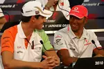 Foto zur News: Adrian Sutil (Force India) und Lewis Hamilton (McLaren)