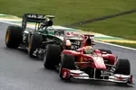 Foto zur News: Felipe Massa (Ferrari) und Heikki Kovalainen (Lotus)