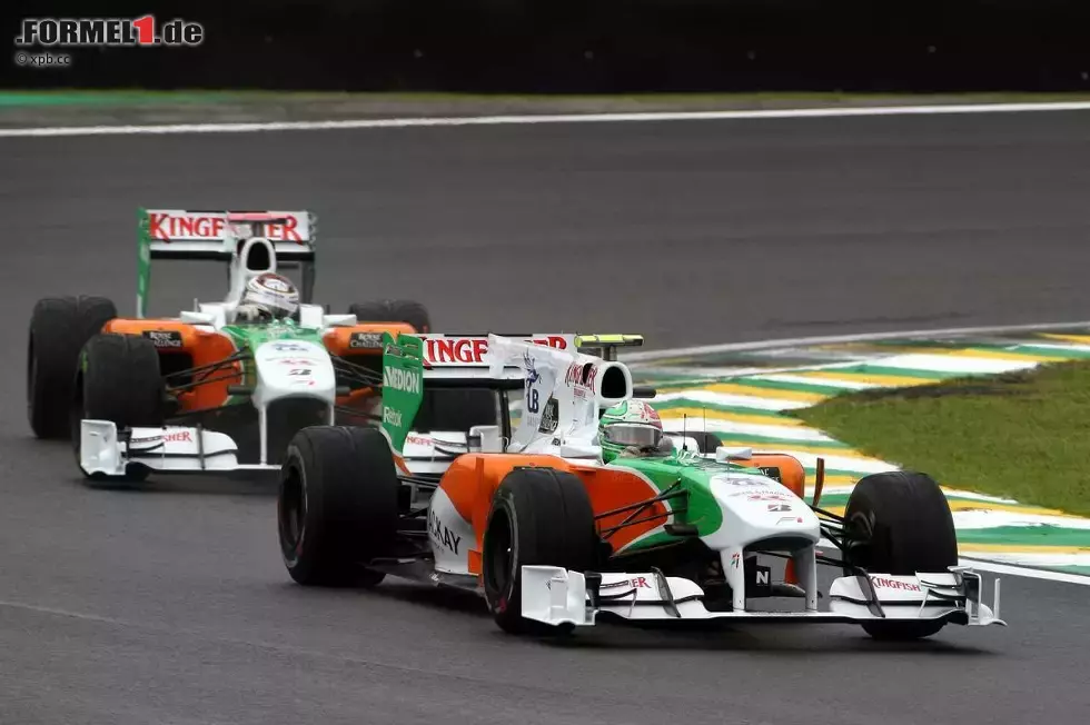 Foto zur News: Vitantonio Liuzzi vor Adrian Sutil (Force India)