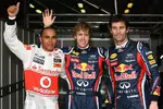 Foto zur News: Lewis Hamilton (McLaren), Sebastian Vettel (Red Bull) und Mark Webber (Red Bull)