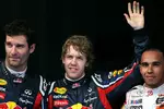 Foto zur News: Mark Webber (Red Bull), Sebastian Vettel (Red Bull) und Lewis Hamilton (McLaren)