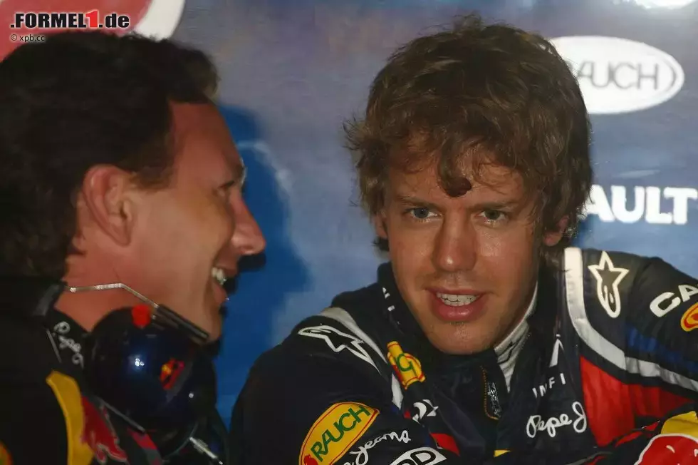 Foto zur News: Christian Horner (Teamchef) und Sebastian Vettel (Red Bull)