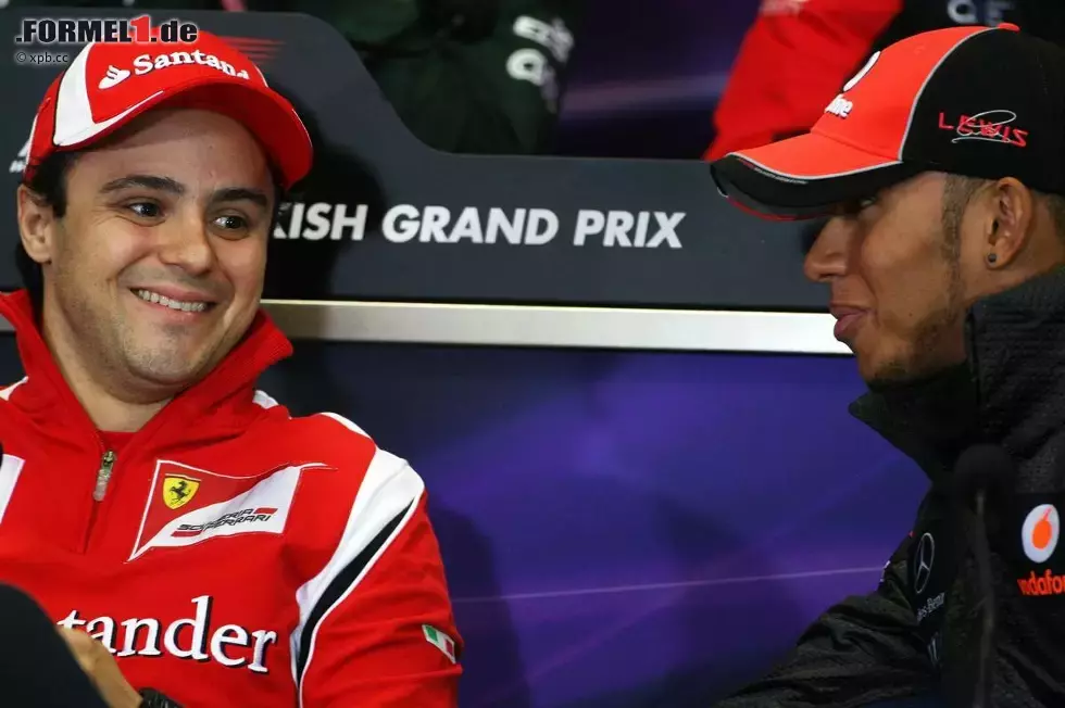 Foto zur News: Felipe Massa (Ferrari) und Lewis Hamilton (McLaren)