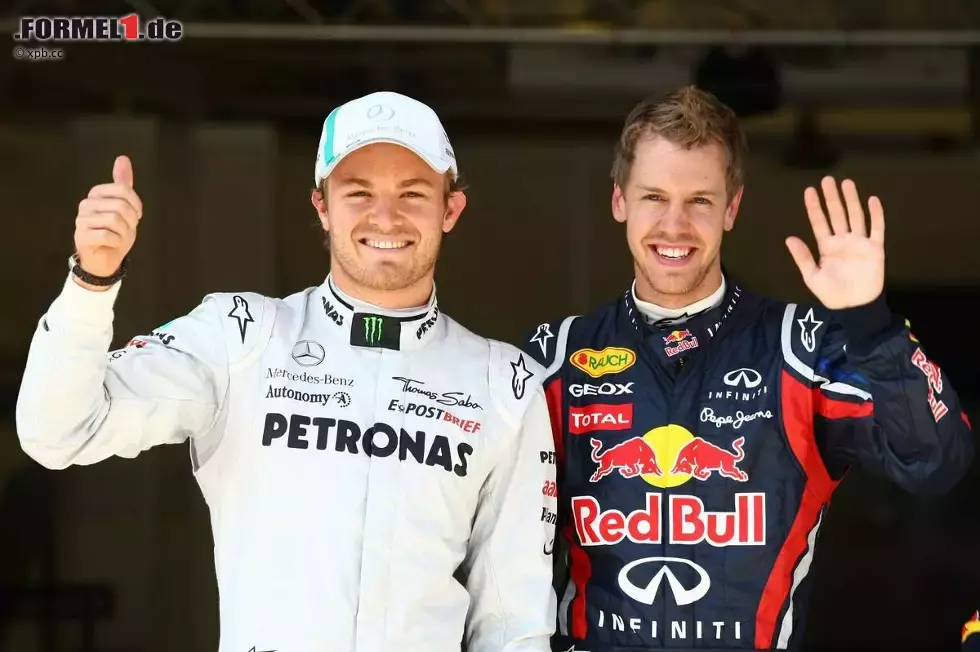 Foto zur News: Nico Rosberg (Mercedes) und Sebastian Vettel (Red Bull)