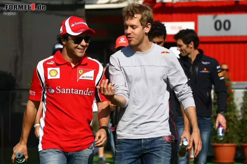 Foto zur News: Felipe Massa (Ferrari) und Sebastian Vettel (Red Bull)