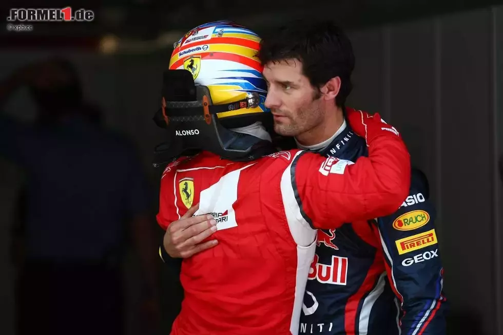 Foto zur News: Fernando Alonso (Ferrari) und Mark Webber (Red Bull)