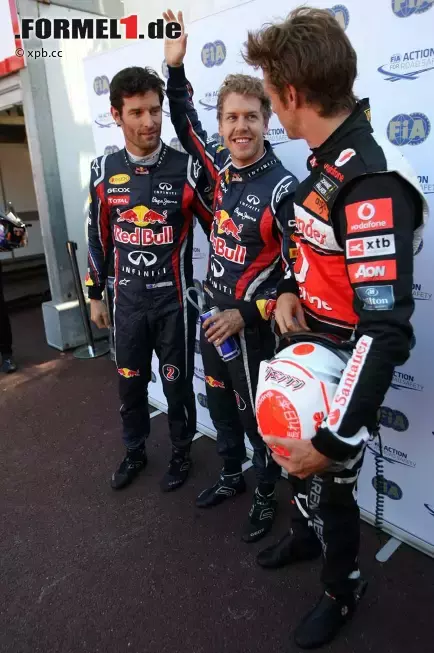 Foto zur News: Mark Webber (Red Bull), Sebastian Vettel (Red Bull) und Jenson Button (McLaren)