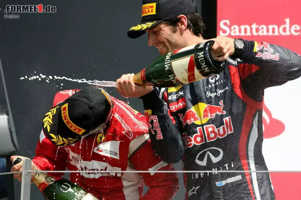 Foto zur News: Fernando Alonso (Ferrari) und Mark Webber (Red Bull)