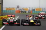 Foto zur News: Lewis Hamilton (McLaren) und Sebastian Vettel (Red Bull)