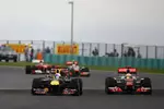 Foto zur News: Lewis Hamilton (McLaren) und Sebastian Vettel (Red Bull)