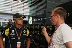 Foto zur News: Heikki Kovalainen (Lotus) mit Mika Salo