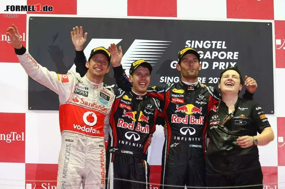 Foto zur News: Jenson Button (McLaren), Sebastian Vettel (Red Bull) und Mark Webber (Red Bull)