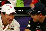 Foto zur News: Kamui Kobayashi (Sauber) und Sebastian Vettel (Red Bull)