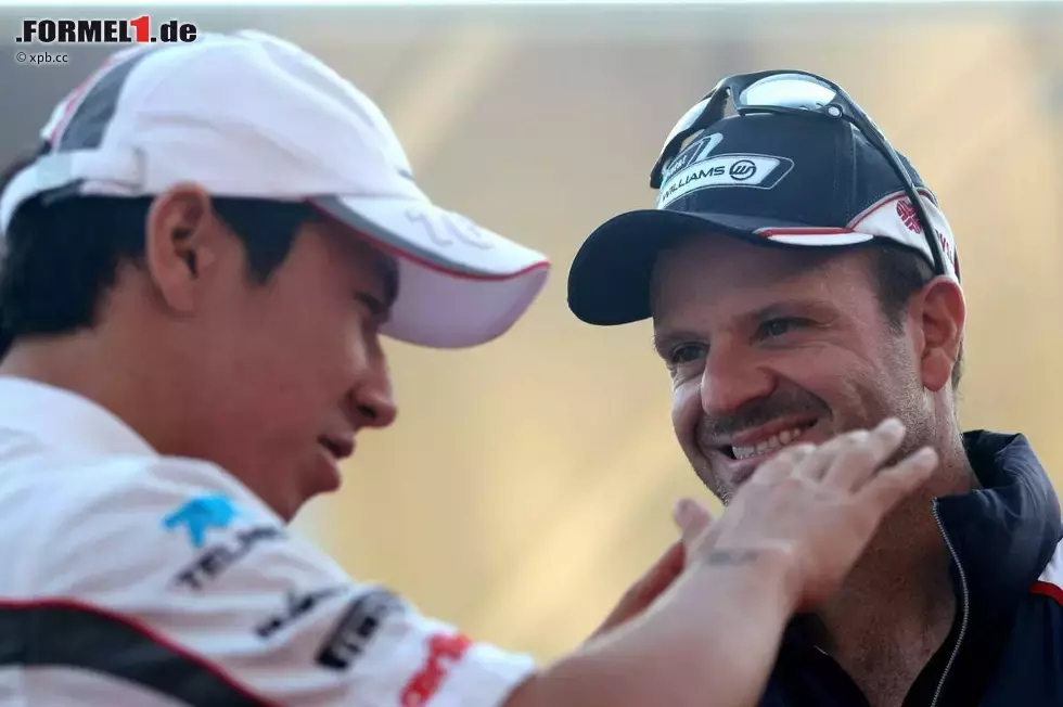 Foto zur News: Kamui Kobayashi (Sauber) und Rubens Barrichello (Williams)