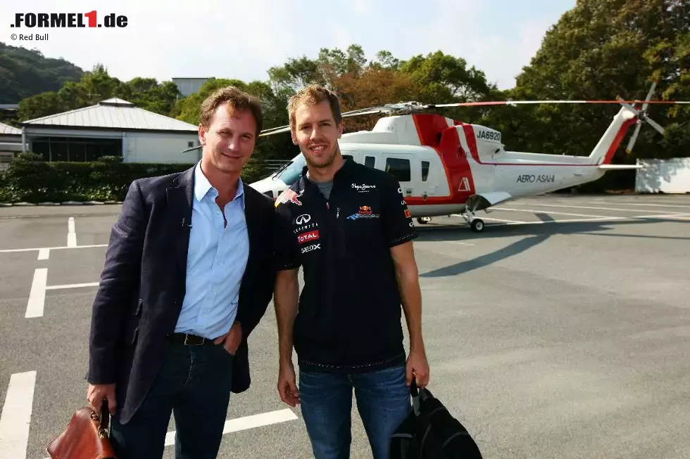 Foto zur News: Christian Horner (Teamchef) und Sebastian Vettel (Red Bull)