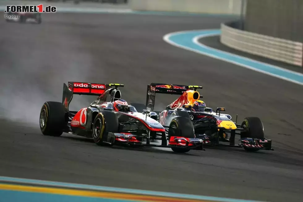 Foto zur News: Jenson Button (McLaren) und Mark Webber (Red Bull)