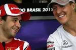 Foto zur News: Felipe Massa (Ferrari) und Michael Schumacher (Mercedes)