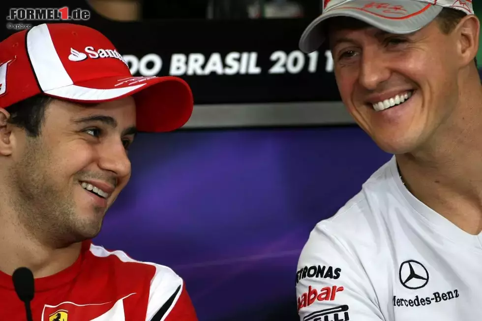 Foto zur News: Felipe Massa (Ferrari) und Michael Schumacher (Mercedes)