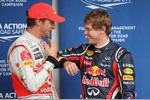 Foto zur News: Jenson Button (McLaren) und Sebastian Vettel (Red Bull)