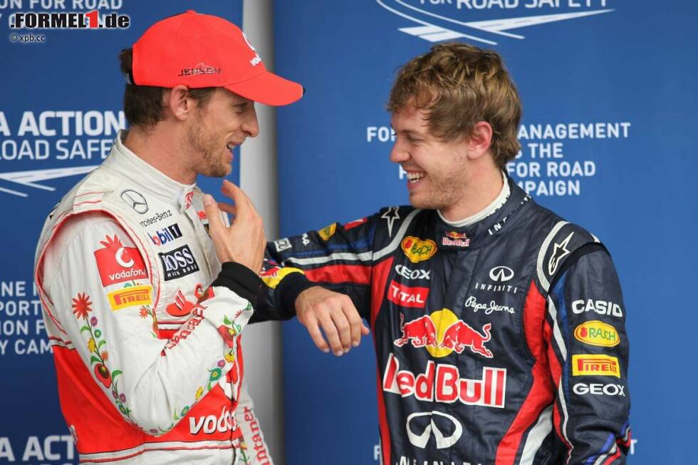 Foto zur News: Jenson Button (McLaren) und Sebastian Vettel (Red Bull)