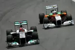 Foto zur News: Michael Schumacher (Mercedes) und Paul di Resta (Force India)