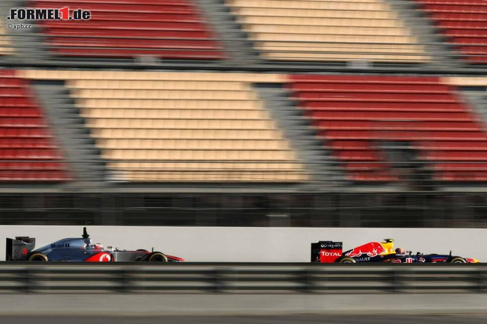 Foto zur News: Jenson Button (McLaren) Mark Webber (Red Bull)