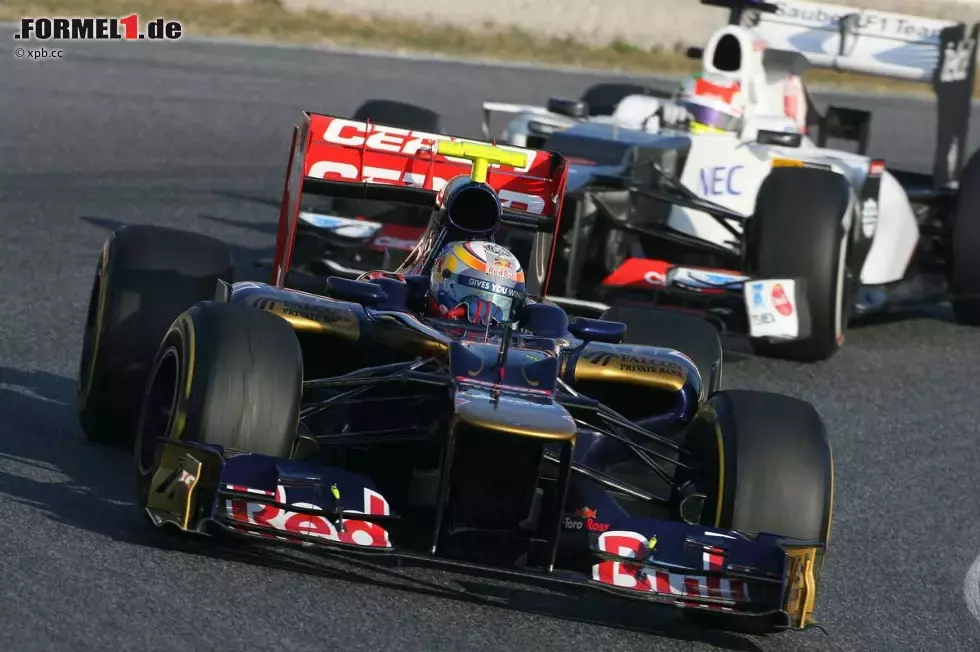 Foto zur News: Jean-Eric Vergne (Toro Rosso) und Sergio Perez (Sauber)