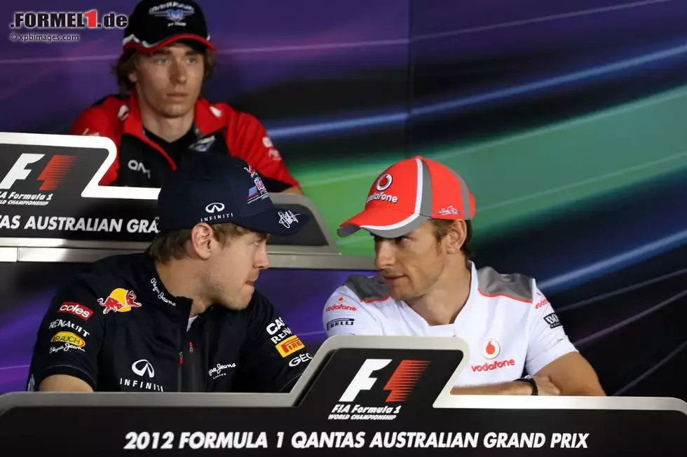 Foto zur News: Sebastian Vettel (Red Bull) und Jenson Button (McLaren)