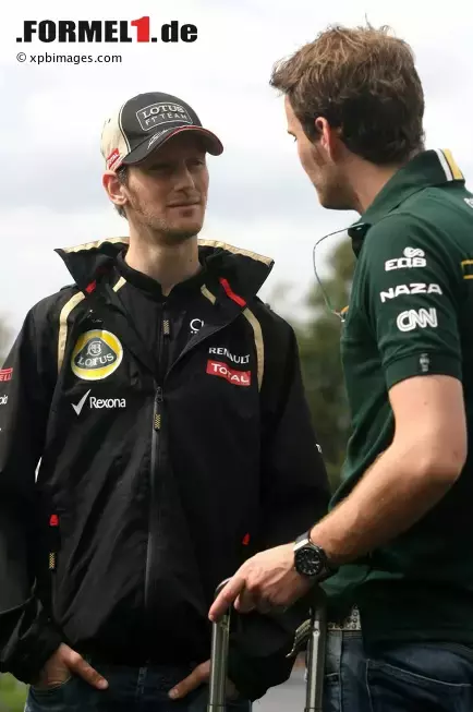 Foto zur News: Romain Grosjean (Lotus) und Giedo van der Garde (Caterham)