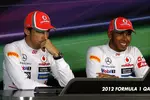 Foto zur News: Jenson Button (McLaren) und Lewis Hamilton (McLaren)