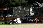 Foto zur News: Kamui Kobayashi (Sauber) und Kimi Räikkönen (Lotus)