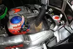 Foto zur News: Jenson Button (McLaren) braucht Kühlung - bei der schwülen Hitze in Malaysia verständlich.