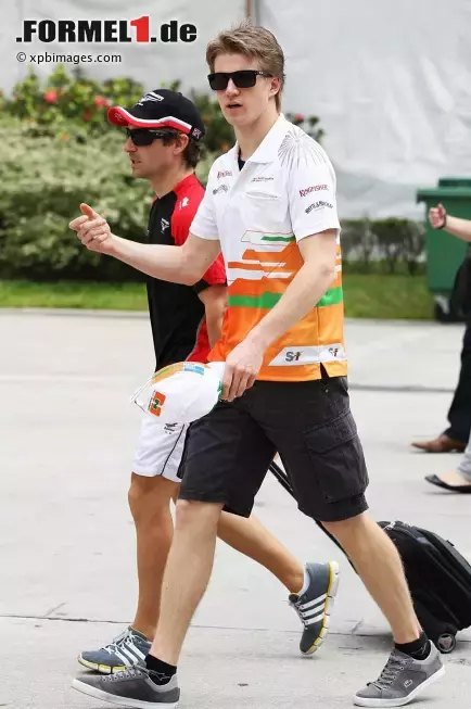 Foto zur News: Nico Hülkenberg (Force India) und Timo Glock (Marussia)