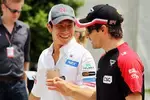 Foto zur News: Kamui Kobayashi (Sauber) und Timo Glock (Marussia)