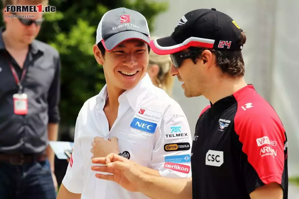 Foto zur News: Kamui Kobayashi (Sauber) und Timo Glock (Marussia)