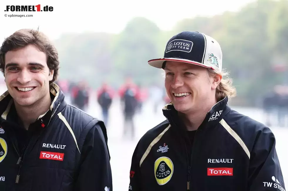 Foto zur News: Jerome D&#039;Ambrosio (Lotus) und Kimi Räikkönen (Lotus)