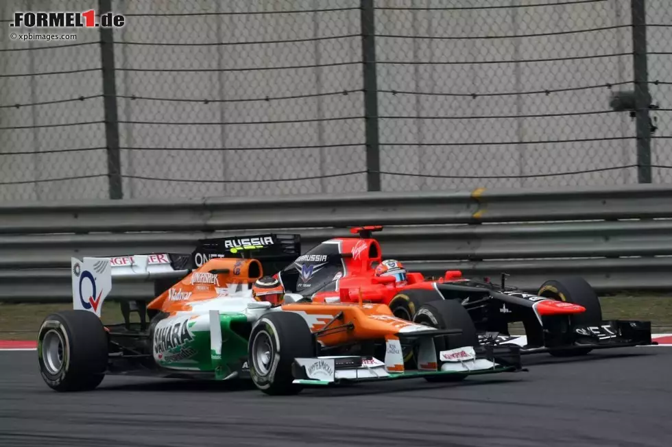 Foto zur News: Nico Hülkenberg (Force India) und Timo Glock (Marussia)