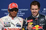 Foto zur News: Lewis Hamilton (McLaren) und Sebastian Vettel (Red Bull)