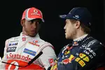 Foto zur News: Lewis Hamilton (McLaren) und  Sebastian Vettel (Red Bull)